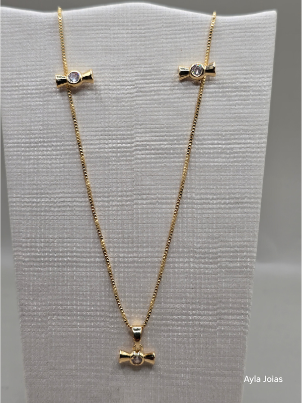 Conjunto Infantil Bala Cravejada – Banhado a Ouro (30 cm) - Imagem 2